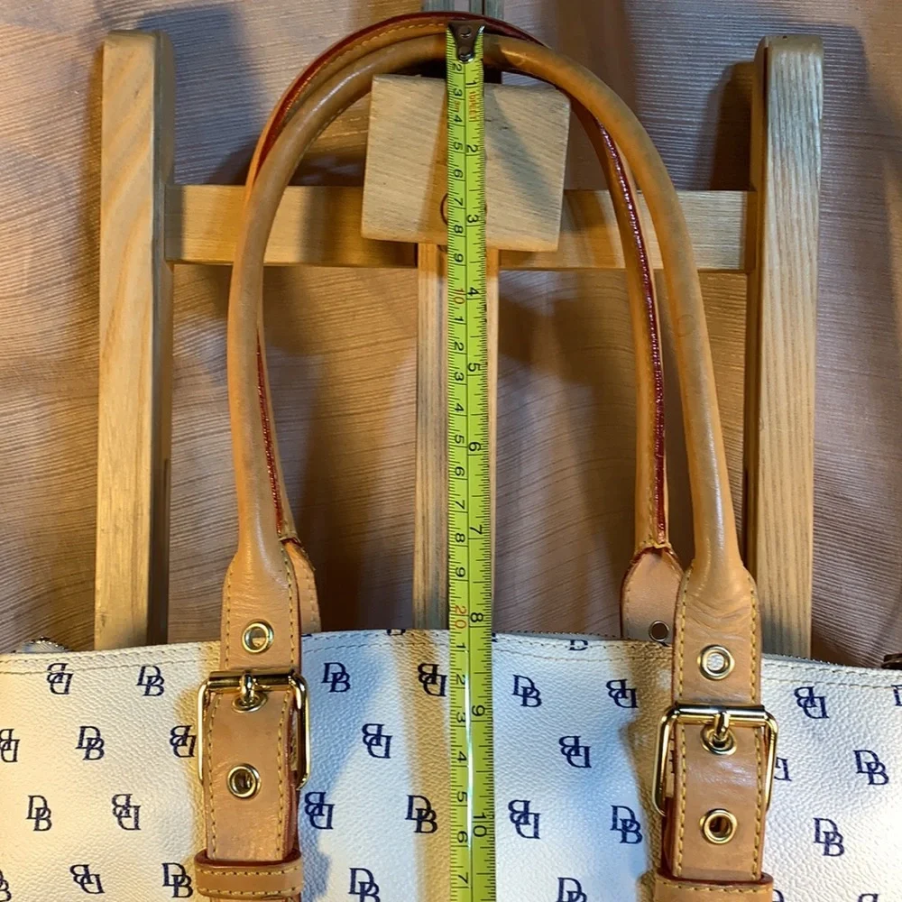 Dooney & Bourke leather satchel w/logo pattern